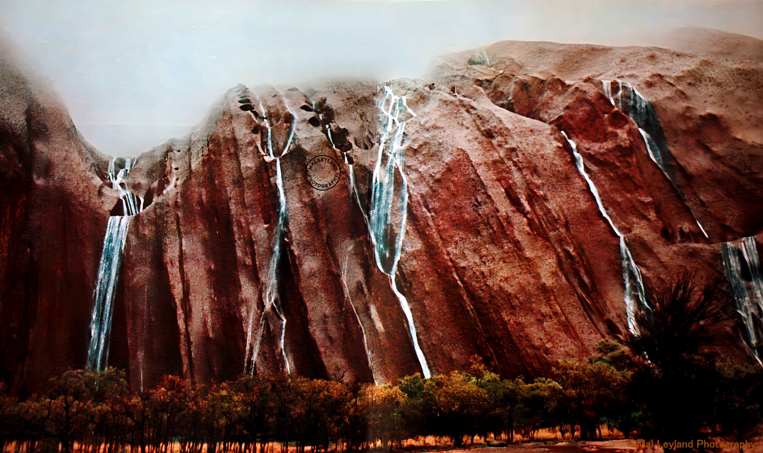 Ayres Rock (Uluru) in the rain - waterfalls - 1966